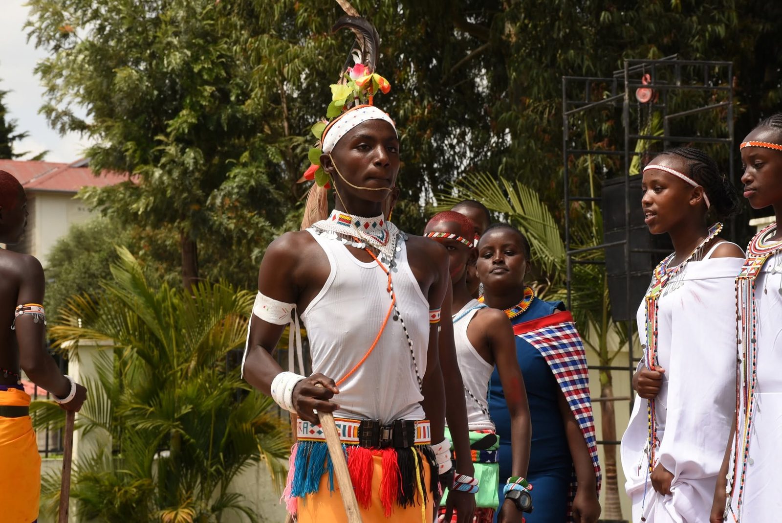 Students in traditional Maasai dress performing a cultural dance